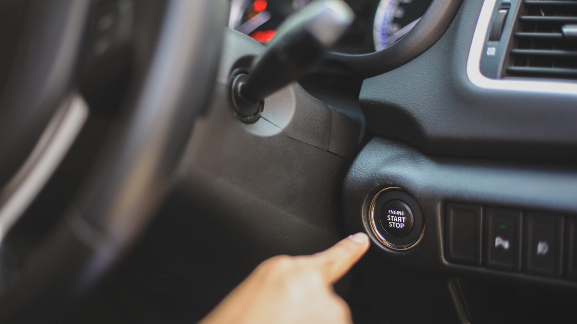 hand-push-start-car-engine-button-2021-09-30-16-35-44-utc